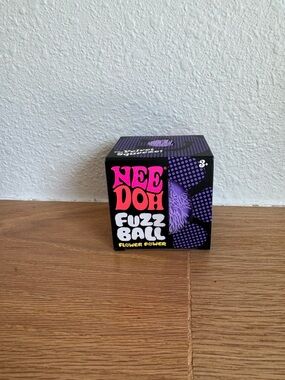 Needoh fuzzball in purple. Flower power